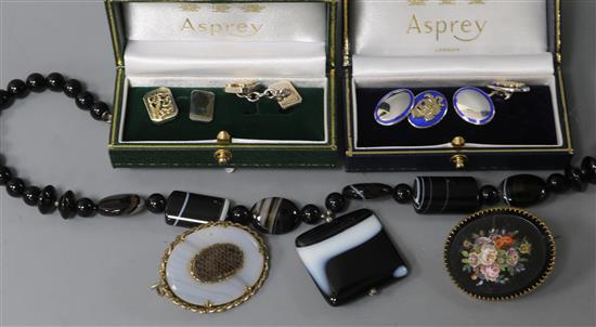 Two cased pairs of Asprey & Co silver cufflinks including a parcel gilt pair and an enamelled pair, a yellow metal micro mosaic brooch